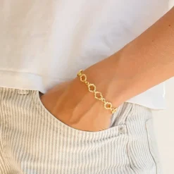 Armbånd i forgyldt messing