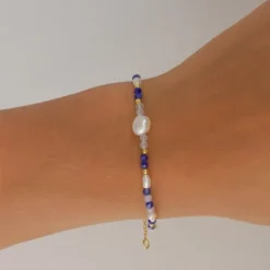 Blå armbånd i forgyldt sølv