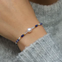 Blå armbånd i forgyldt sølv