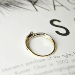 Diamant ring i 14 karat guld.- og hvidguld 0,03 ct