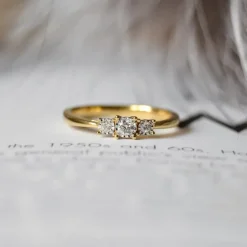 Diamantring i 14 karat guld.- og hvidguld 0,06 ct 0,03 ct