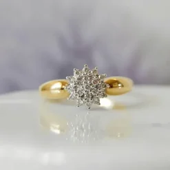 Diamantring i 14 karat guld.- og hvidguld 0,27 ct