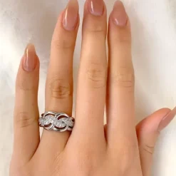Flettet zirkon ring i rhodineret sølv