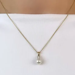 Ægte perle diamantvedhæng i 14 karat guld 0,10 ct