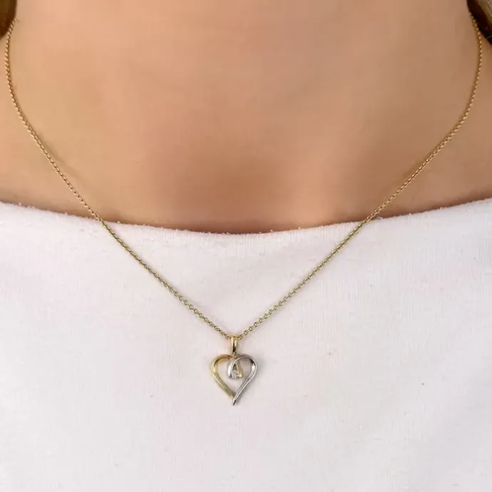 Hjerte diamant vedhæng i 14 karat guld.- og hvidguld 0,02 ct