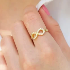 Infinity ring i forgyldt sølv