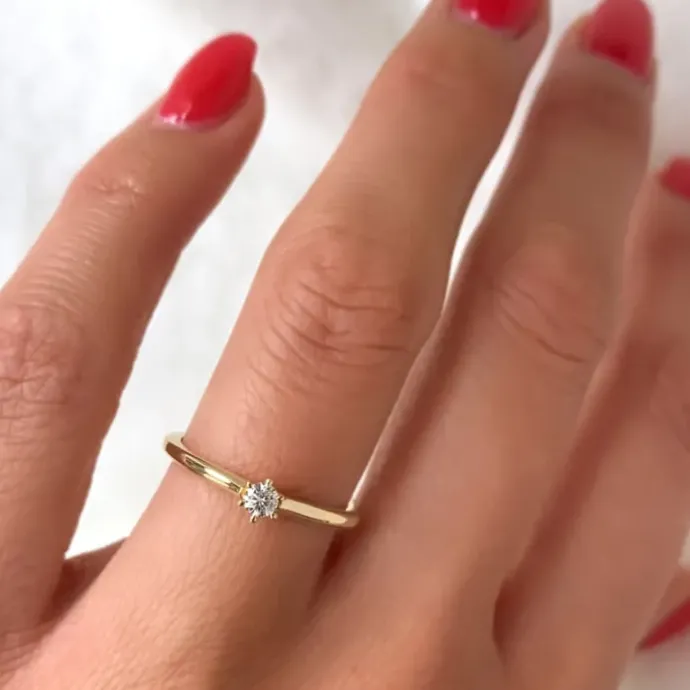 Kampagne - diamant solitairering i 14 karat guld 0,10 ct