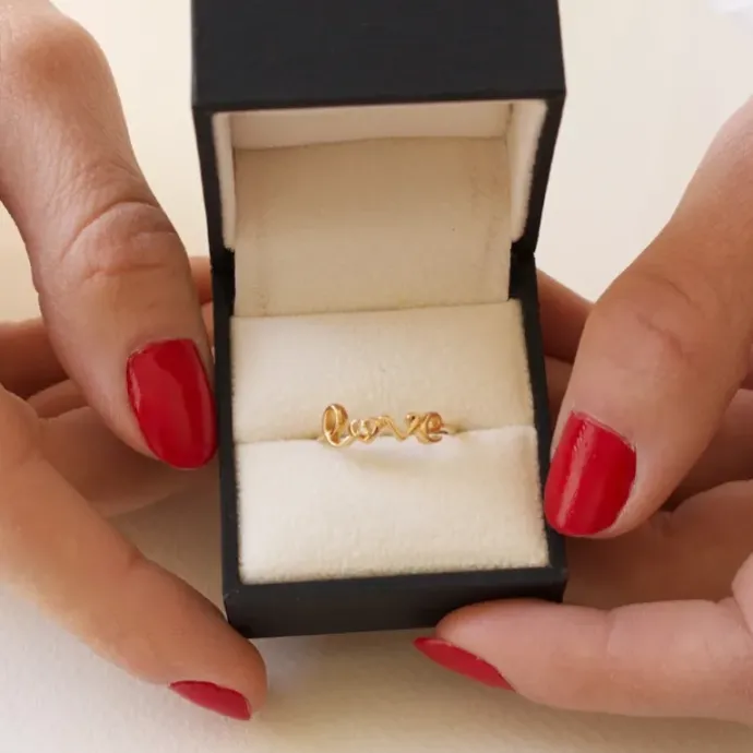 Love ring i forgyldt sølv