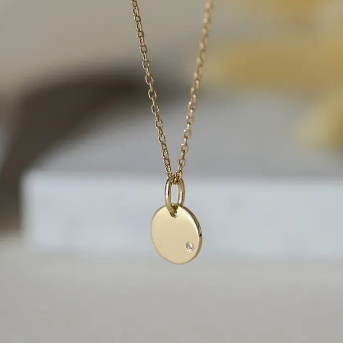 Plade diamant vedhæng i 14 karat guld 0,01 ct
