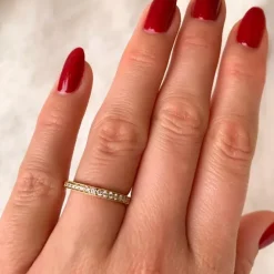 Smal alliancering i 14 karat guld 0,20 ct