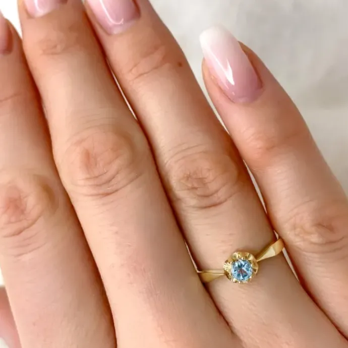 Topas ring i 9 karat guld 0,22 ct