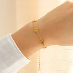 Vandfast blomster armbånd i forgyldt stål - OCEANA