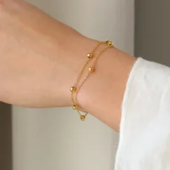 Vandfast kugle armbånd i forgyldt stål - OCEANA