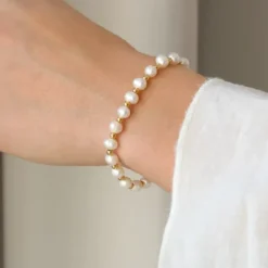 Vandfast perle armbånd i forgyldt stål - OCEANA
